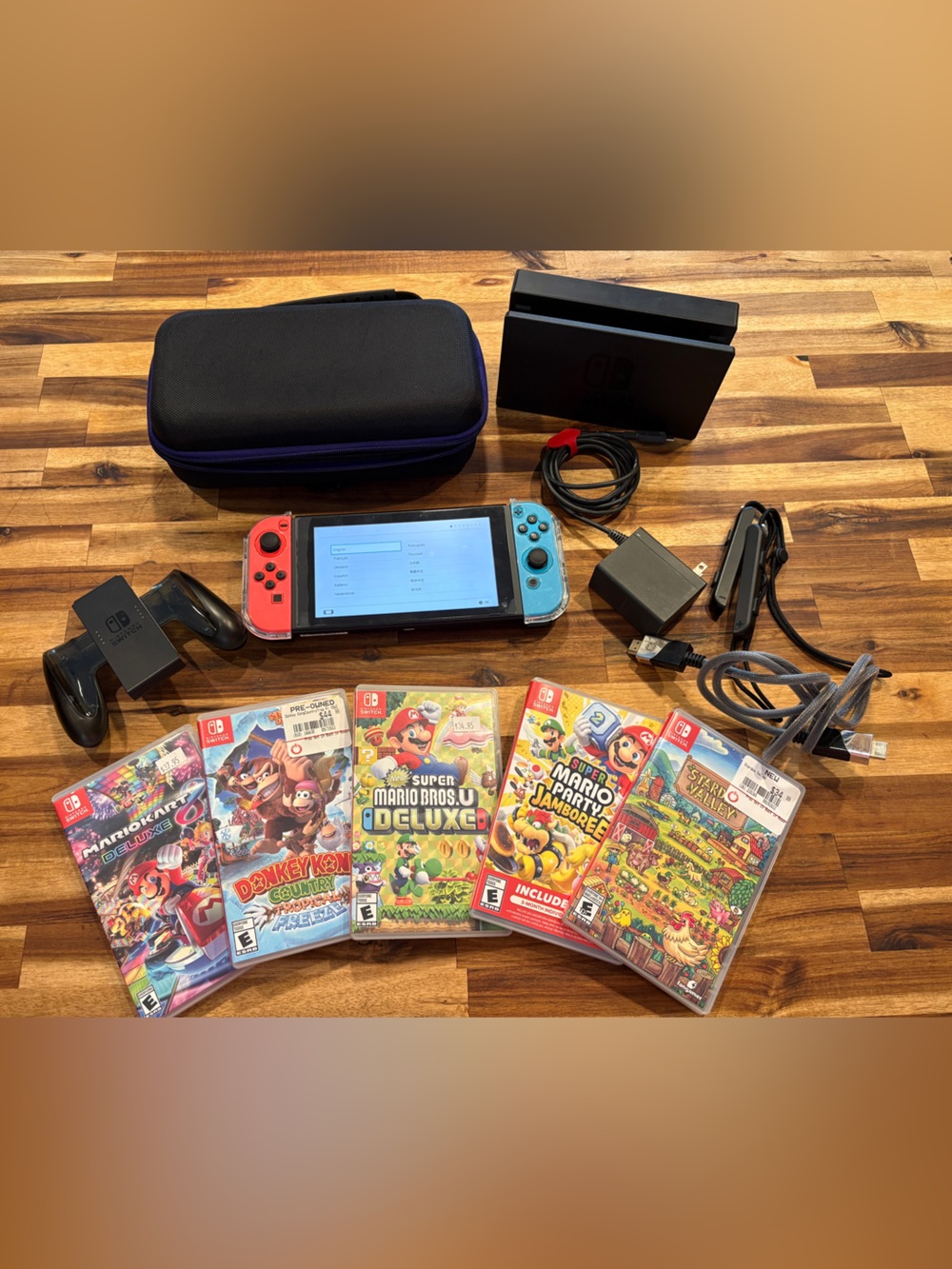 Nintendo Switch with Red & Blue Joy‑Con, Games and Accessories Bundle